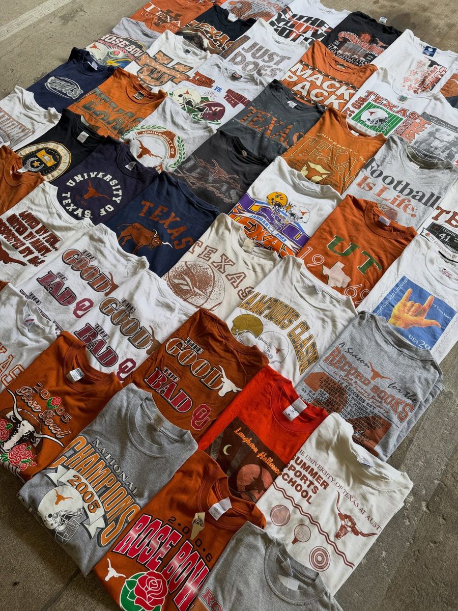 A fresh stack of vintage Longhorns and college football tees