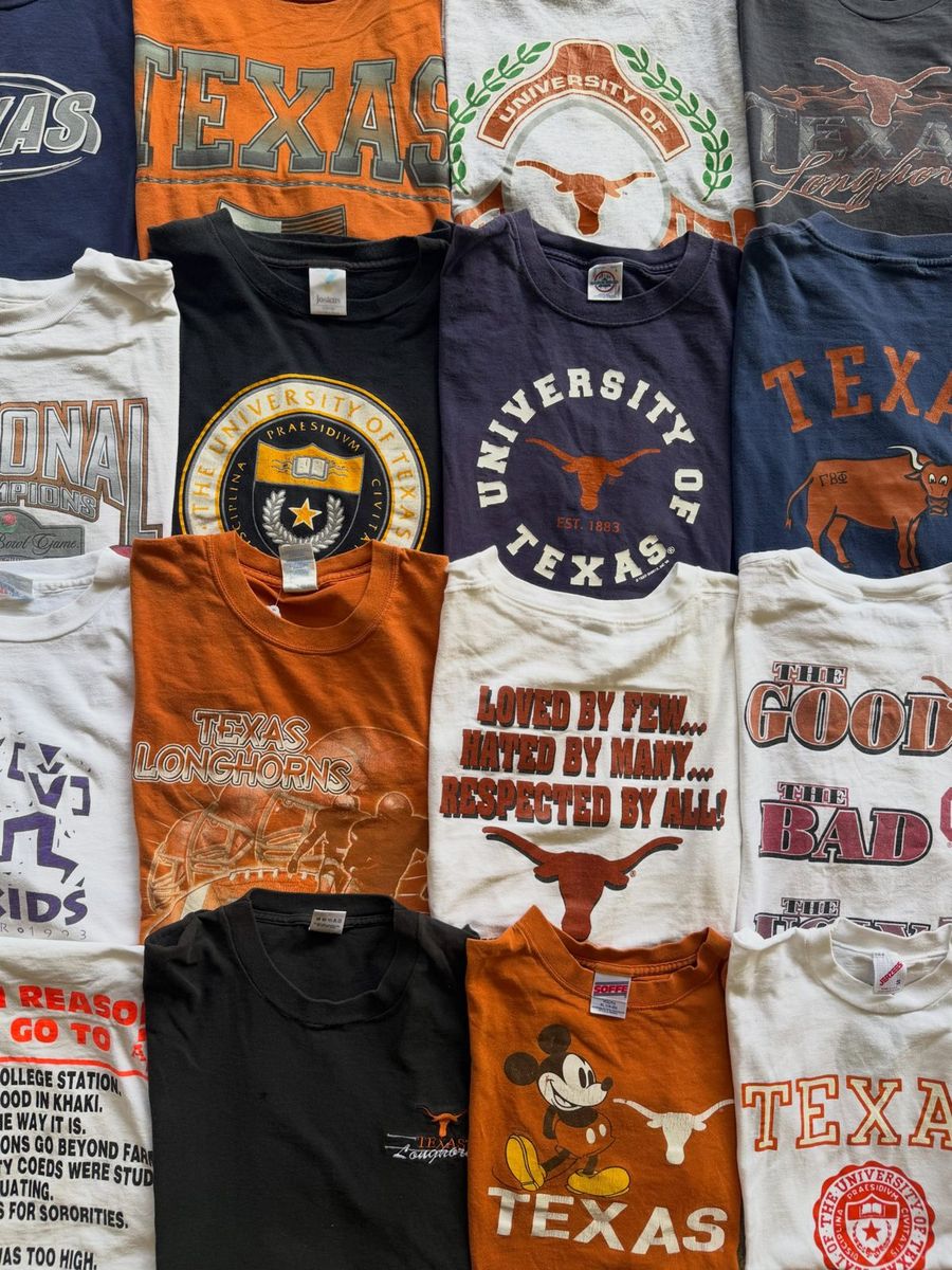 Vintage University of Texas tees laid out in a grid